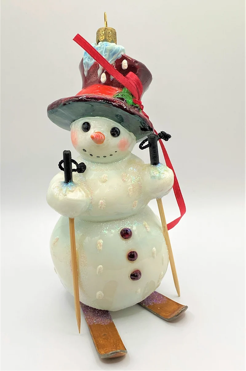 Schneemann fährt Ski, AtlasArt