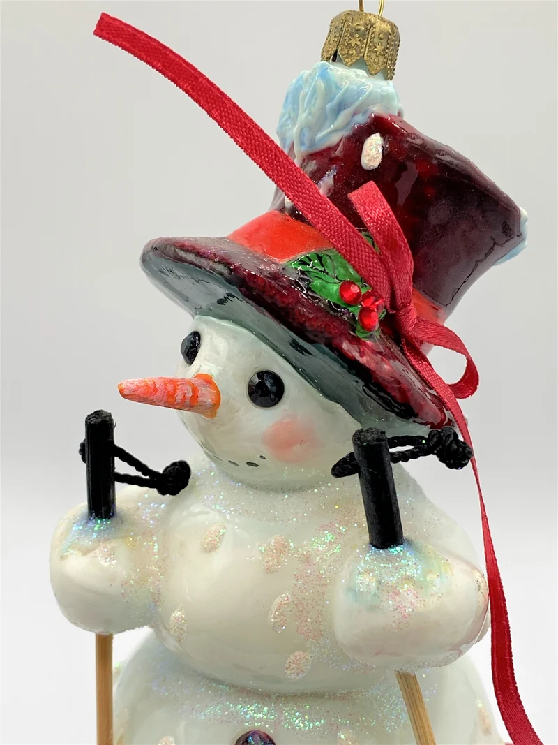 Schneemann fährt Ski, AtlasArt