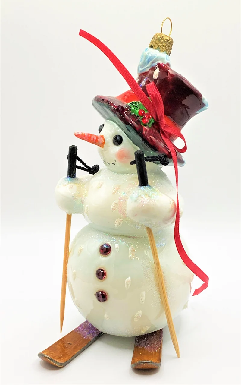 Schneemann fährt Ski, AtlasArt