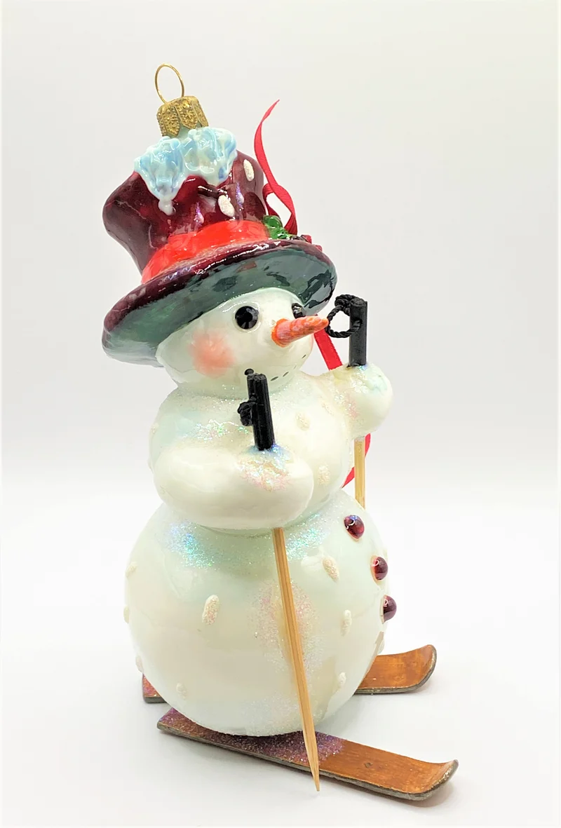 Schneemann fährt Ski, AtlasArt