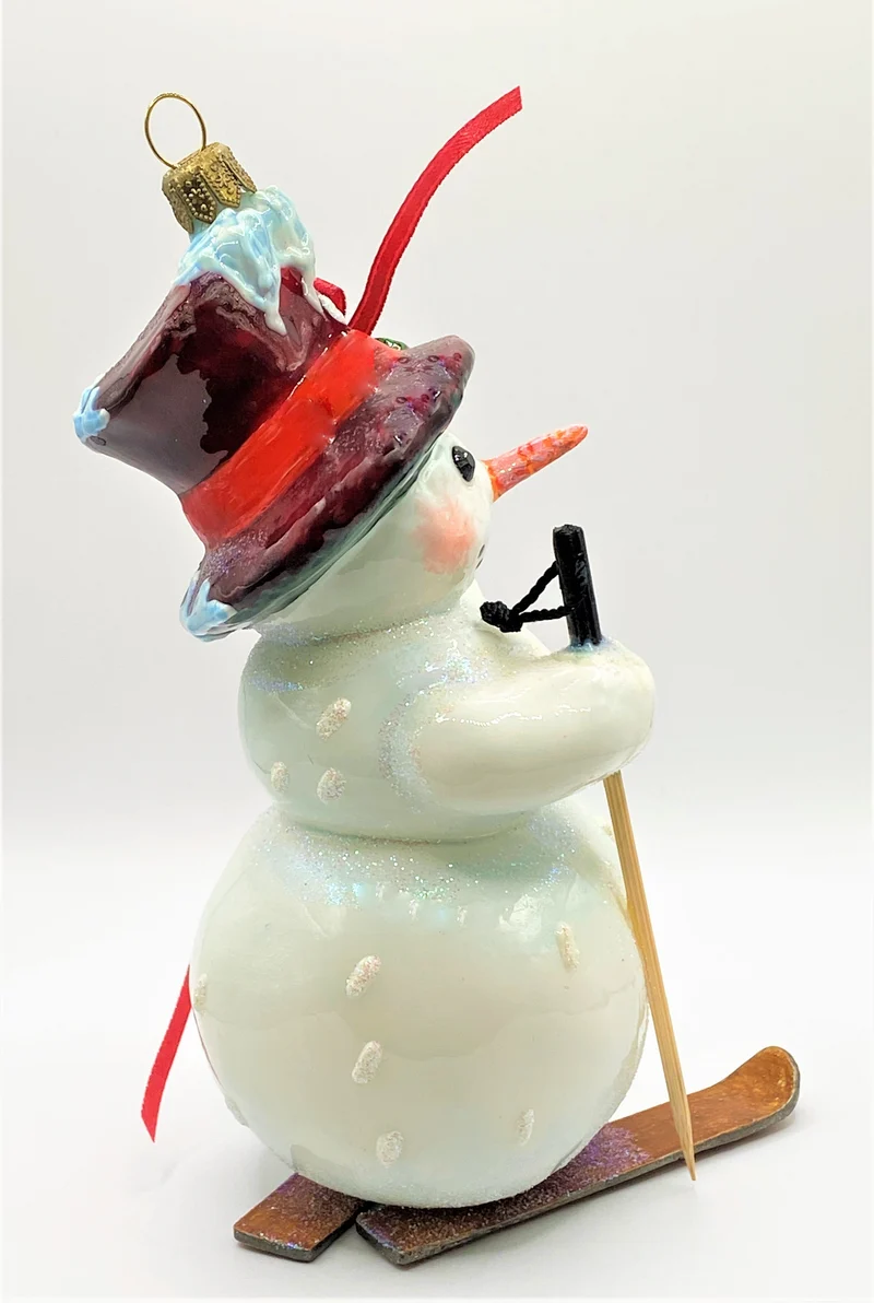 Schneemann fährt Ski, AtlasArt