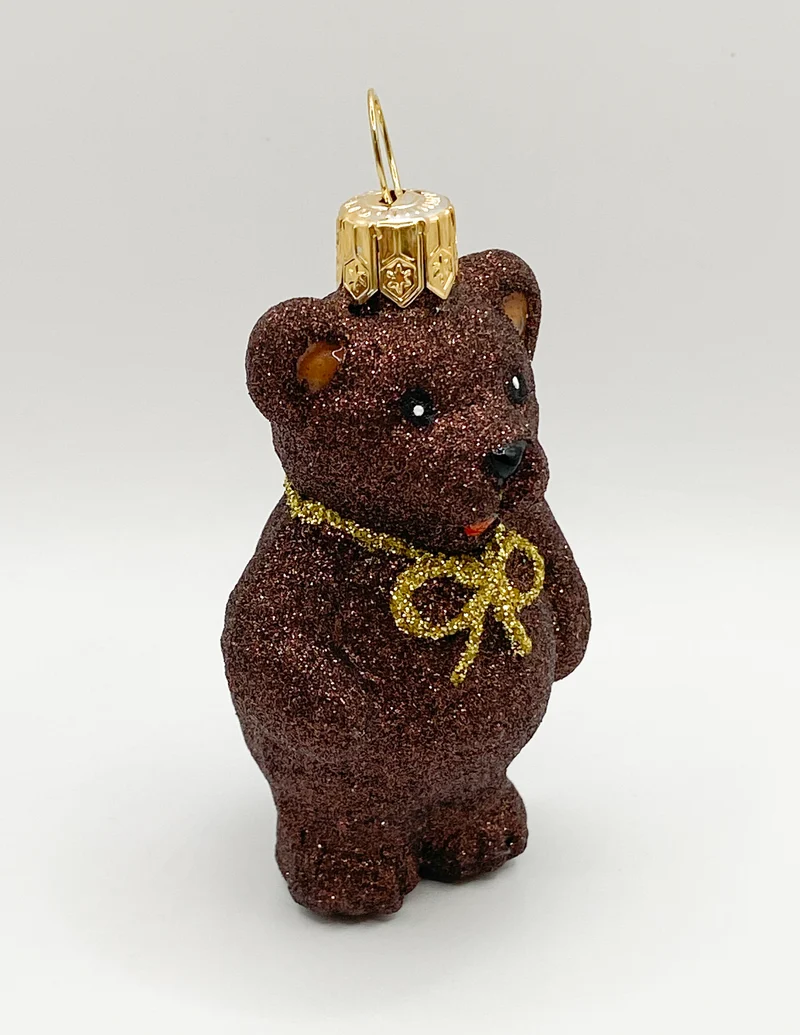 Brauner Teddybär mit goldener Schleife
