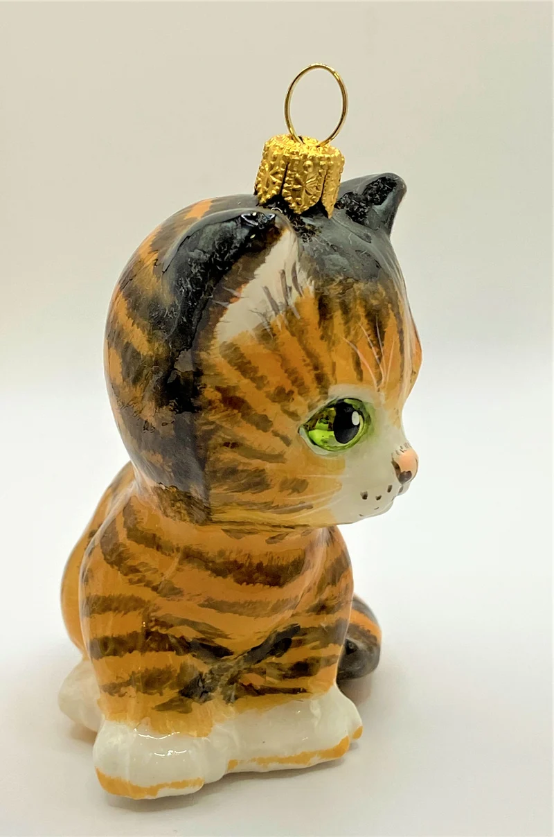 Rotes Tiger- Kätzchen mit grünen Augen, KOMOZJA MOSTOWSKI