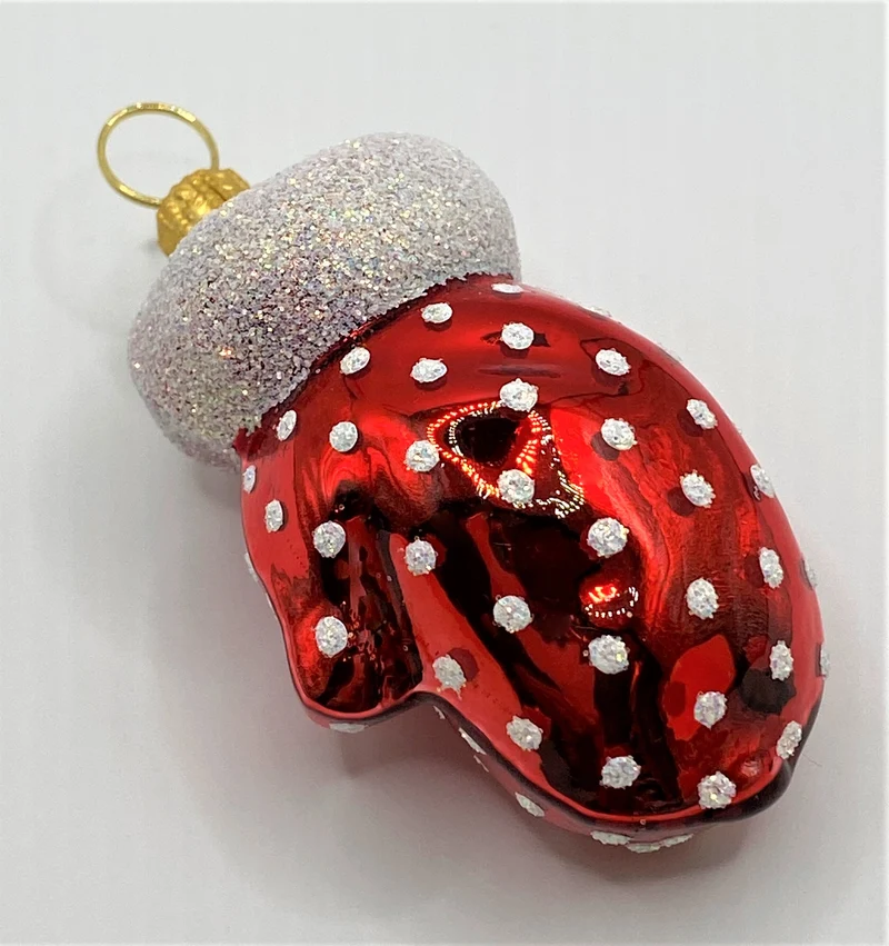 Roter Handschuh mit weissen Tupfen