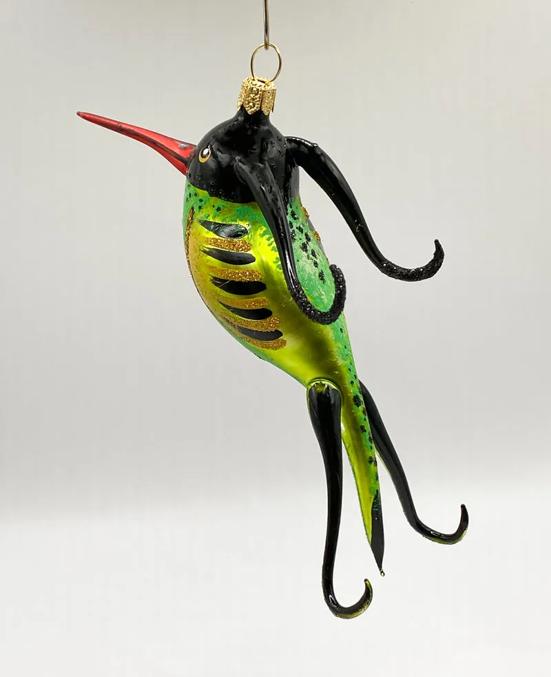 Paradiesvogel mit rotem Schnabel