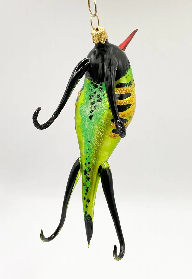 Paradiesvogel mit rotem Schnabel
