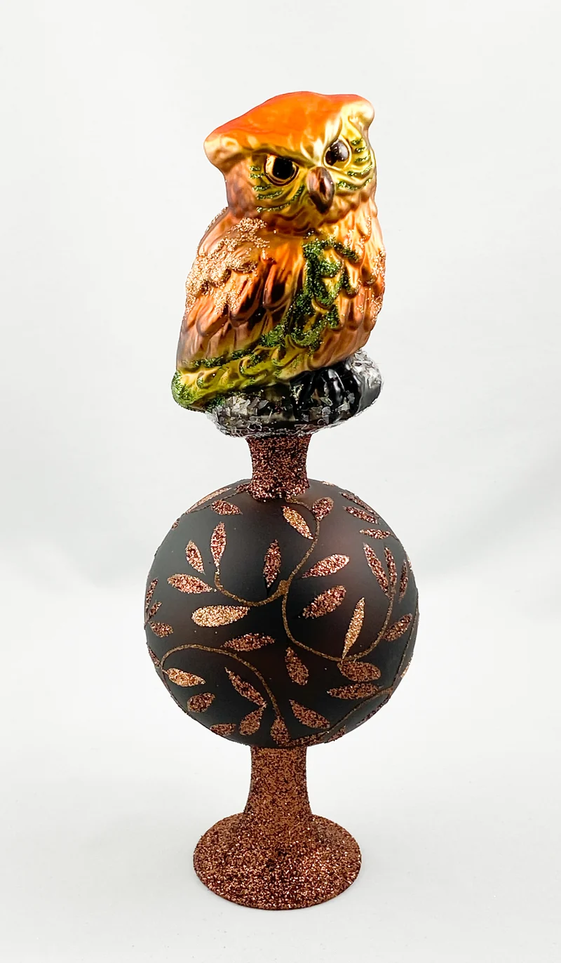 Christbaumspitze mit brauner Kugel und Eule