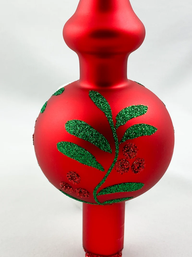 Rote Christbaumspitze mit grünem Blatt-Dekor