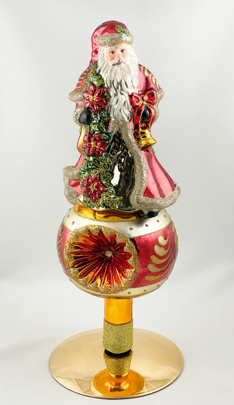 Christbaumspitze Santa mit Weihnachtsstern auf Reflexkugel