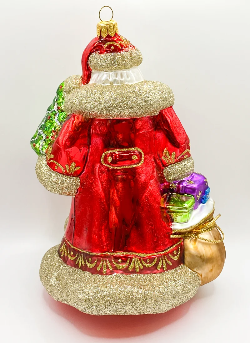Weihnachtsmann in wallendem Mantel und braunem Geschenksack
