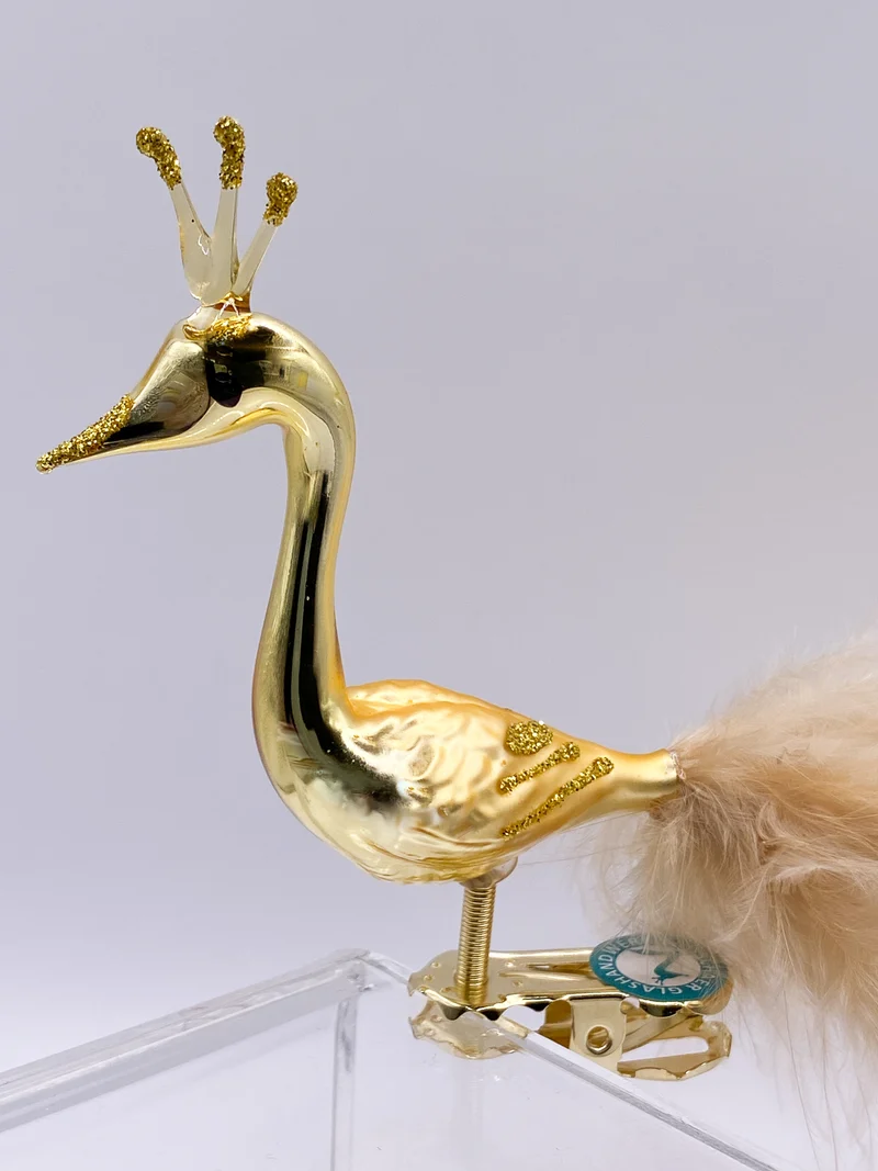 Stilisierter goldener Pfau