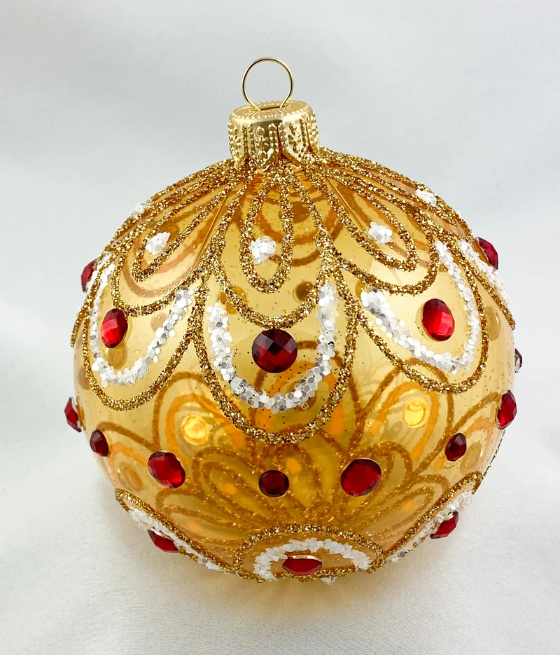 Kugel gold transparent stilisiertem Blätterdekor und roten Steinen
