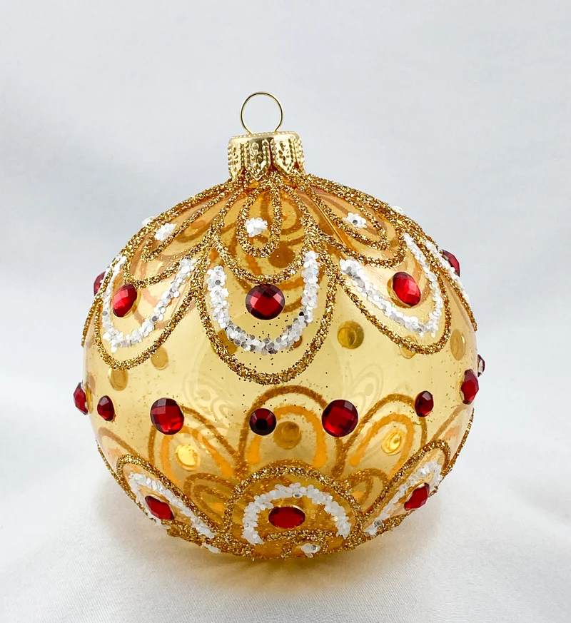Kugel gold transparent stilisiertem Blätterdekor und roten Steinen