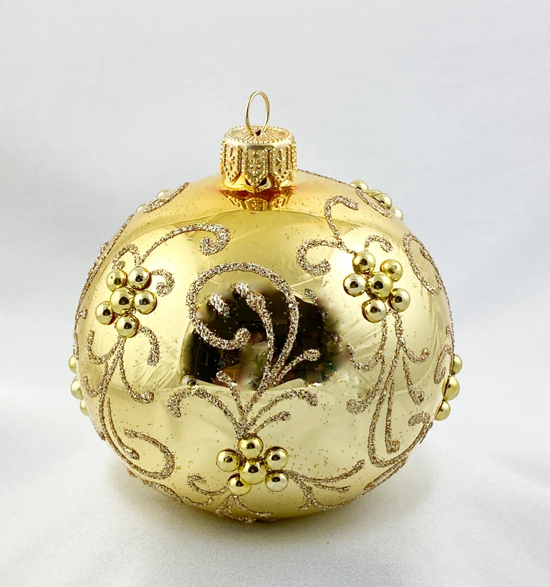 Kugel gold glänzend mit goldenen Ranken