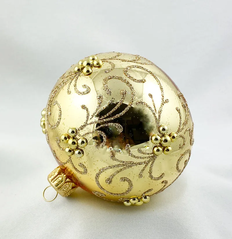 Kugel gold glänzend mit goldenen Ranken