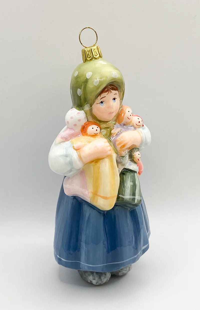 Das Mädchen spielt mit vielen Puppen, KOMOZJA MOSTOWSKI