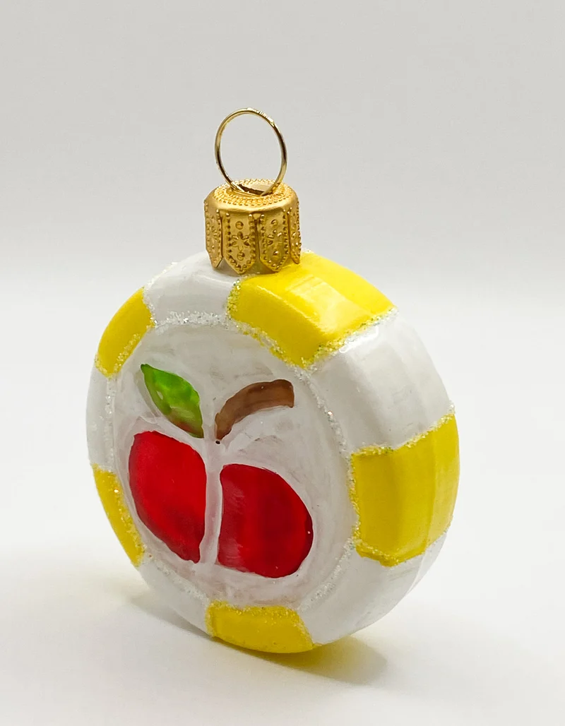 Bunter Bonbon mit rotem Apfel-Motiv