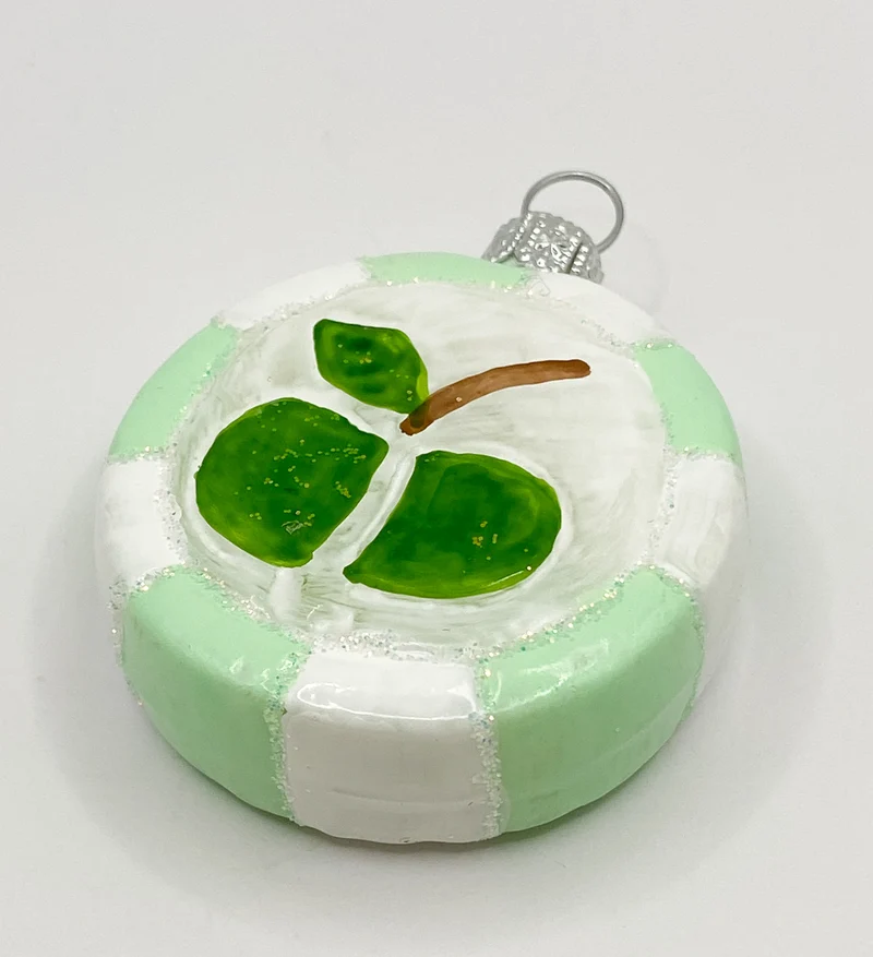 Mintgrüner Bonbon mit grünem Apfel-Motiv