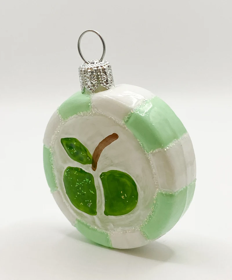 Mintgrüner Bonbon mit grünem Apfel-Motiv