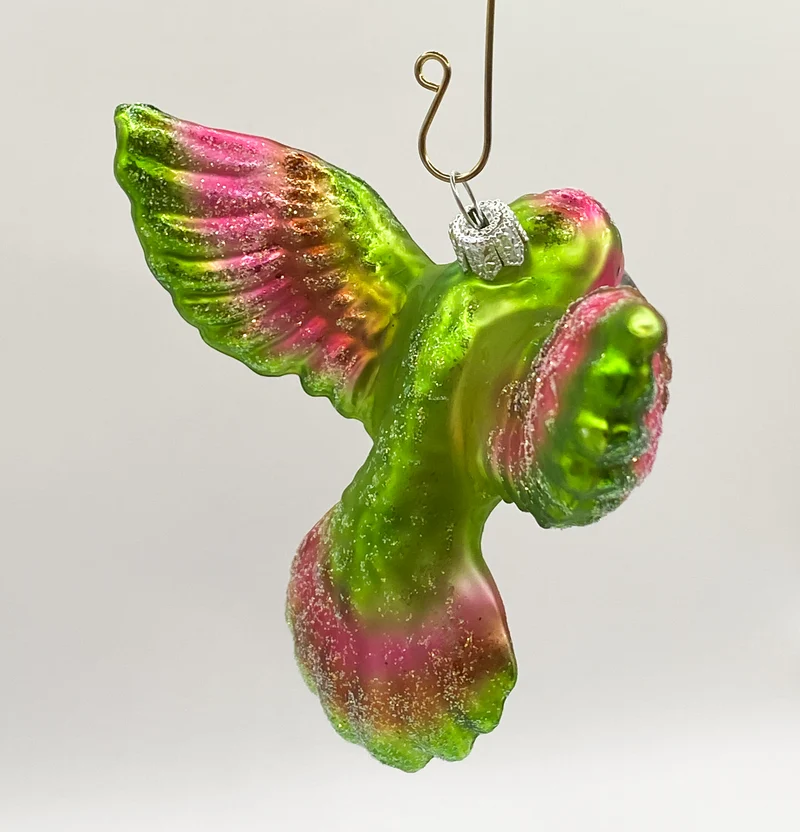 Kolibri fliegend grün und pink