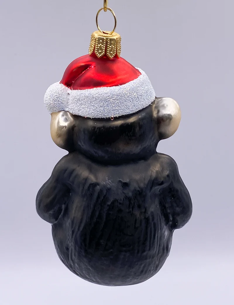 Der Schimpanse freut sich auf Weihnachten