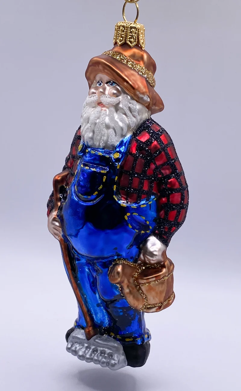 Gärtner-Zwerg in blauen Latzhosen