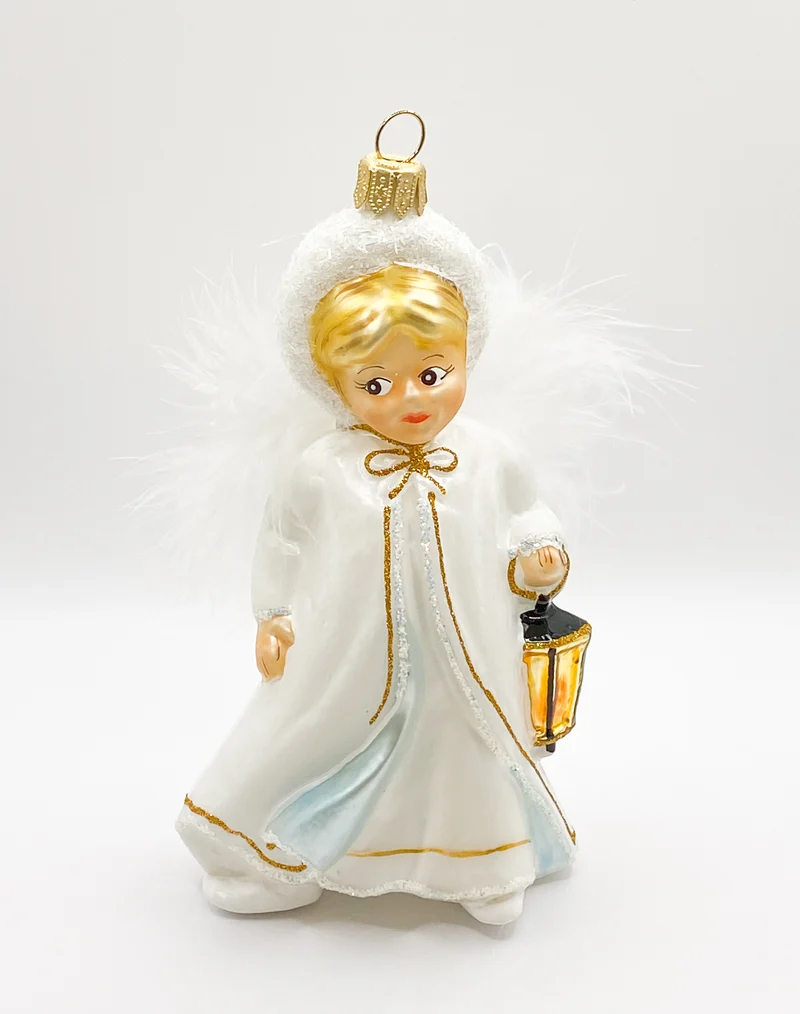 Das Christkind leuchtet mit der Laterne