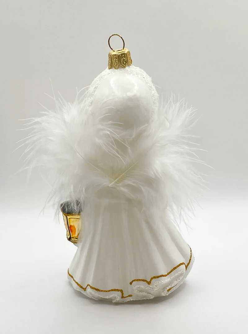 Das Christkind leuchtet mit der Laterne