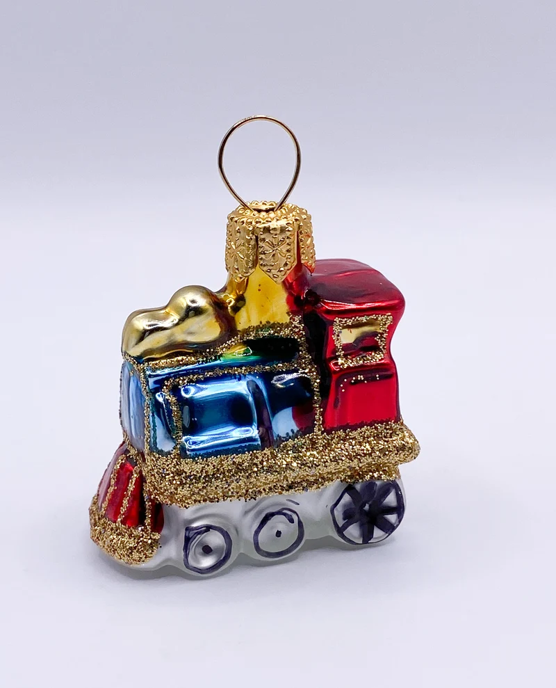 Kleine bunte Lokomotive mit blauem Führerstand