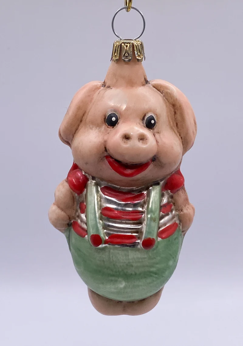Schweinchen in grüner Hose