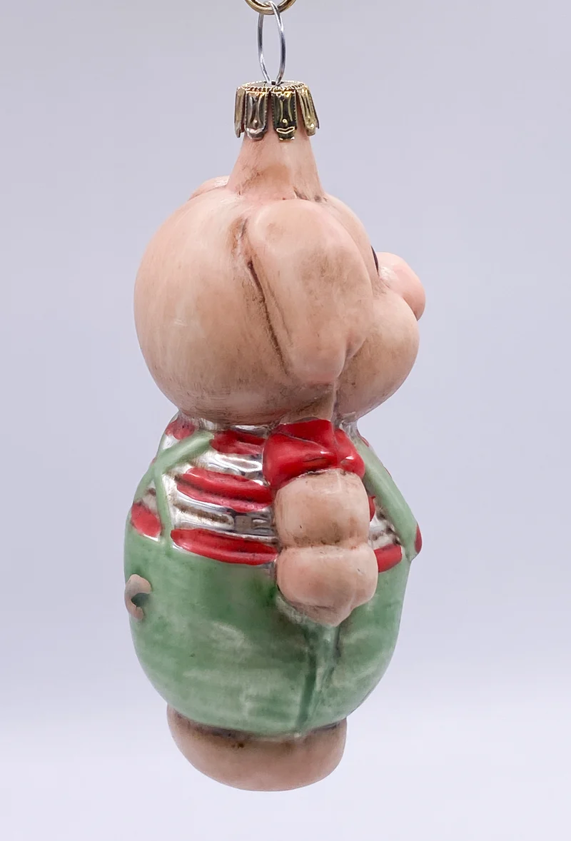 Schweinchen in grüner Hose