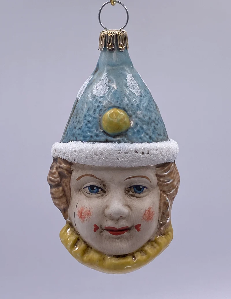 Clown mit hellblauer Mütze