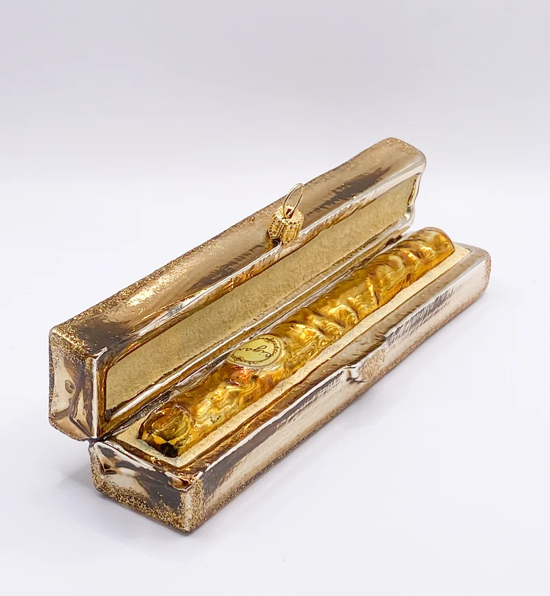 Goldenes Zigarren-Etui mit goldener Zigarre