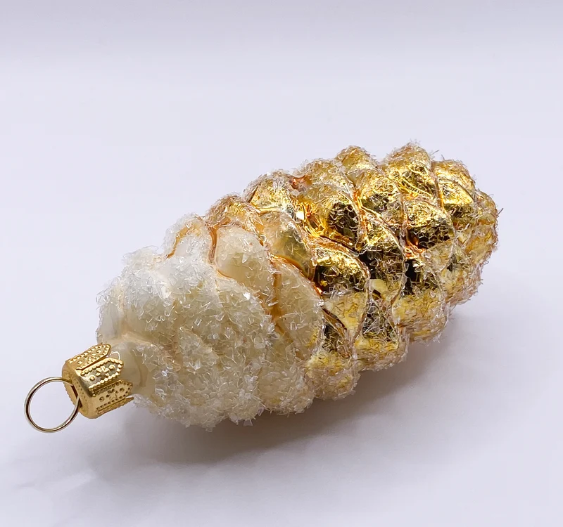 Goldener langer Zapfen mit weisser Kappe