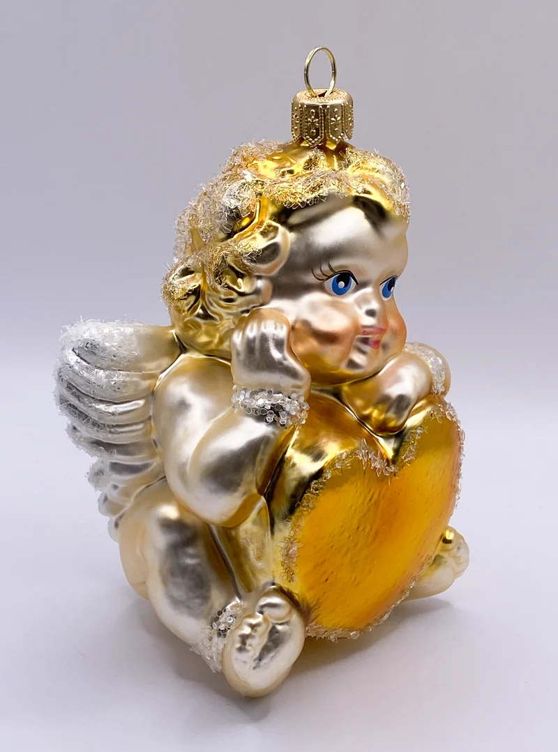 Süsser Engel mit goldenem Herz