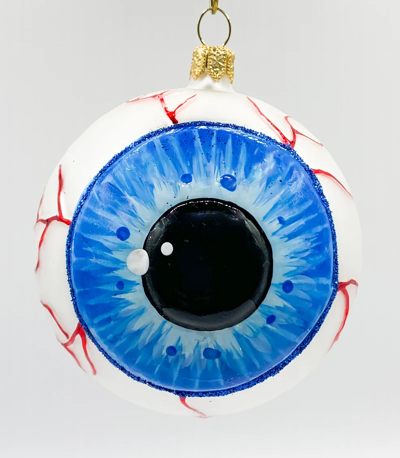 Anatomisches Auge mit blauer Iris und runder Pupille