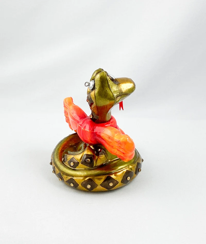 Schlange mit orangem Schal, AtlasArt