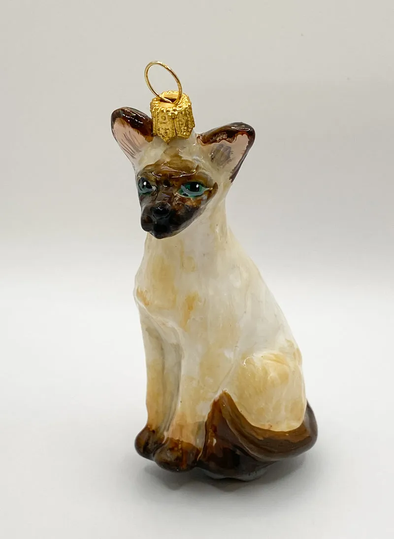Kleine stolze Siam-Katze, KOMOZJA MOSTOWSKI