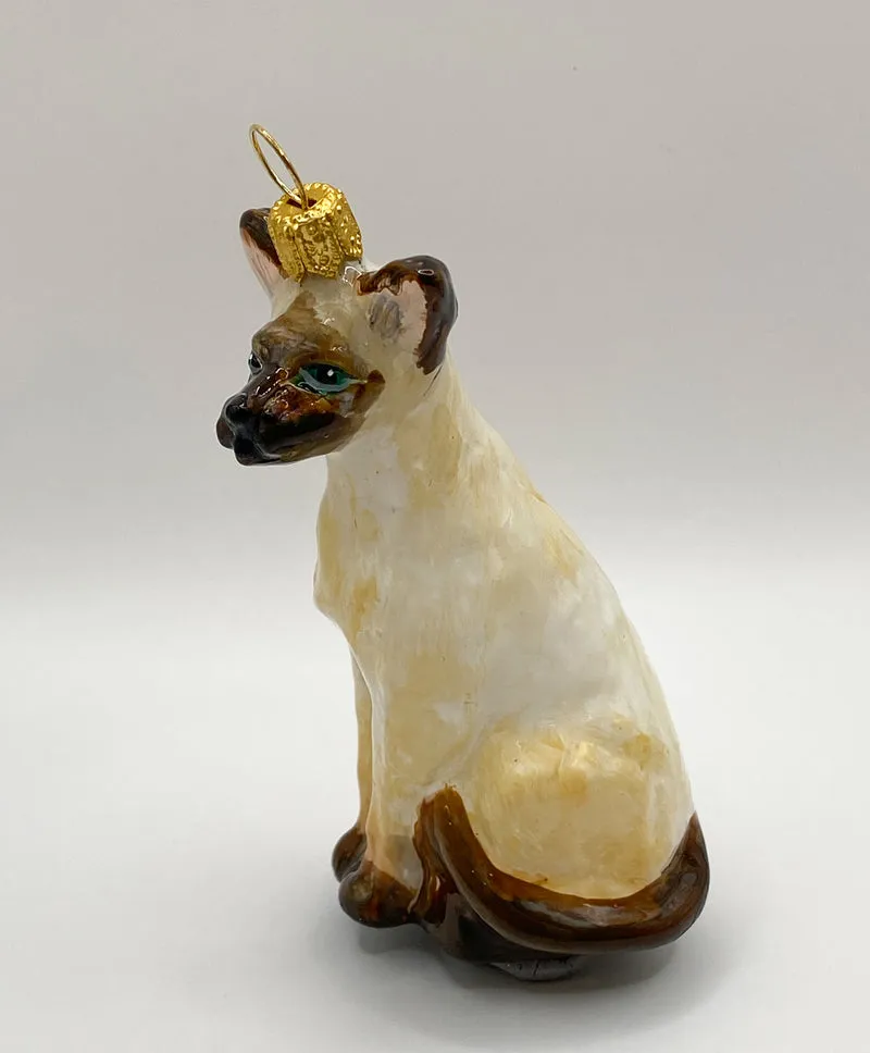 Kleine stolze Siam-Katze, KOMOZJA MOSTOWSKI