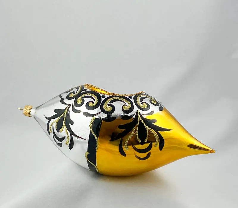 Grosse Olive in Gold/Silber mit goldenem Reflex und schwarzem Dekor