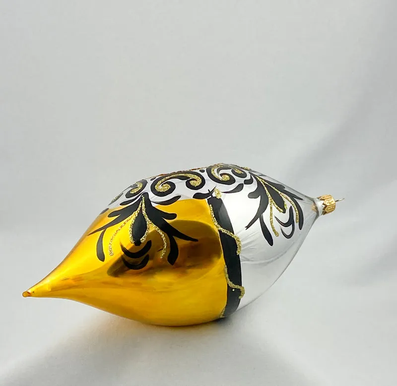 Grosse Olive in Gold/Silber mit goldenem Reflex und schwarzem Dekor