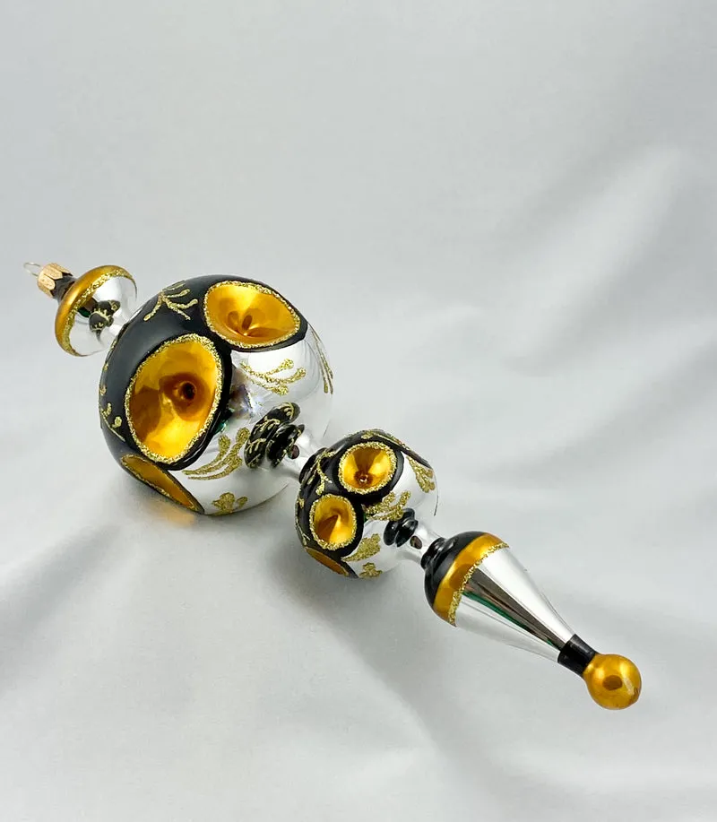 Grosse Fantasie-Form in Silber/Schwarz mit goldenen Reflexen
