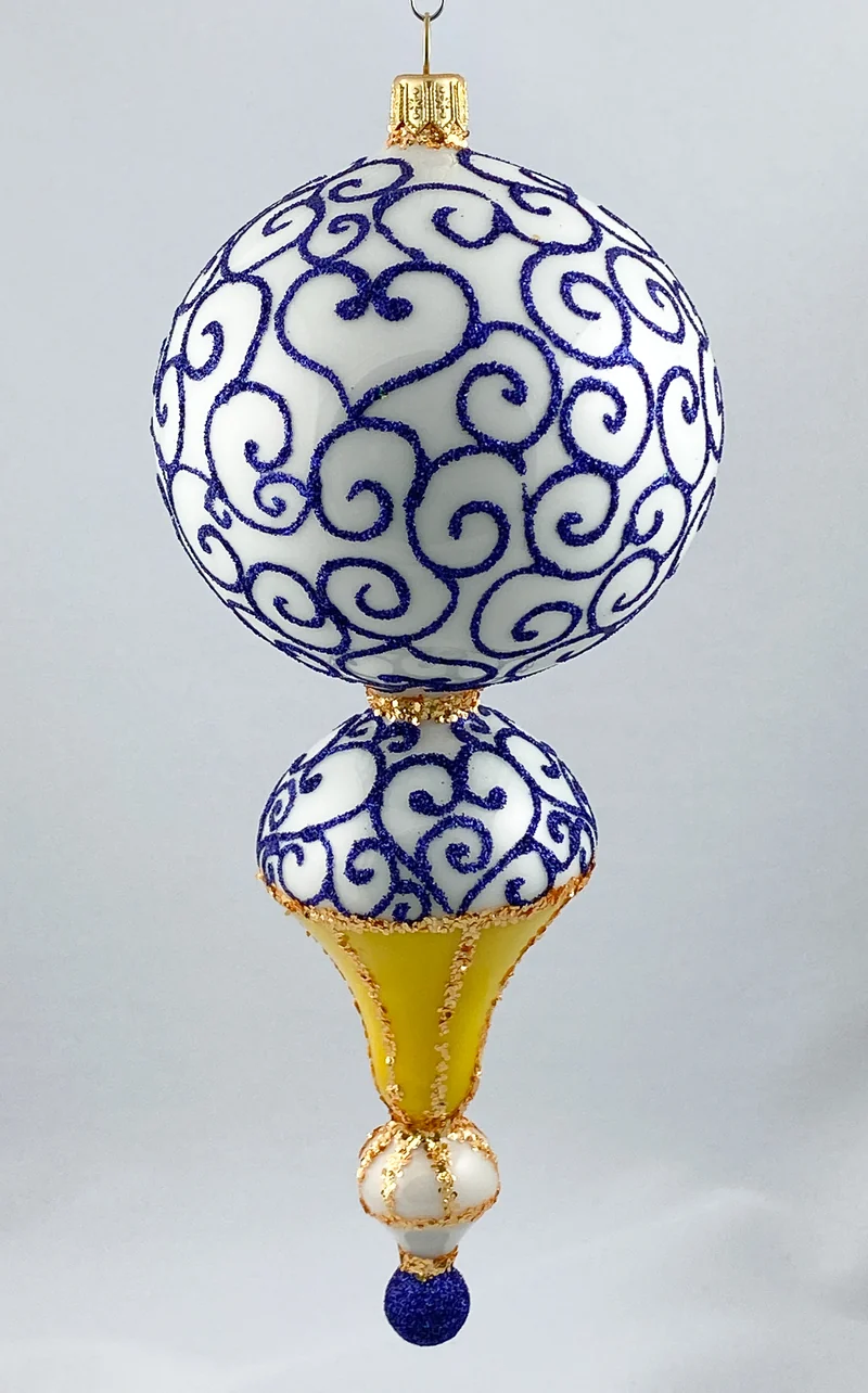 Grosse Fantasie-Form in Weiss und Gold mit goldenem Reflex und blauem Dekor