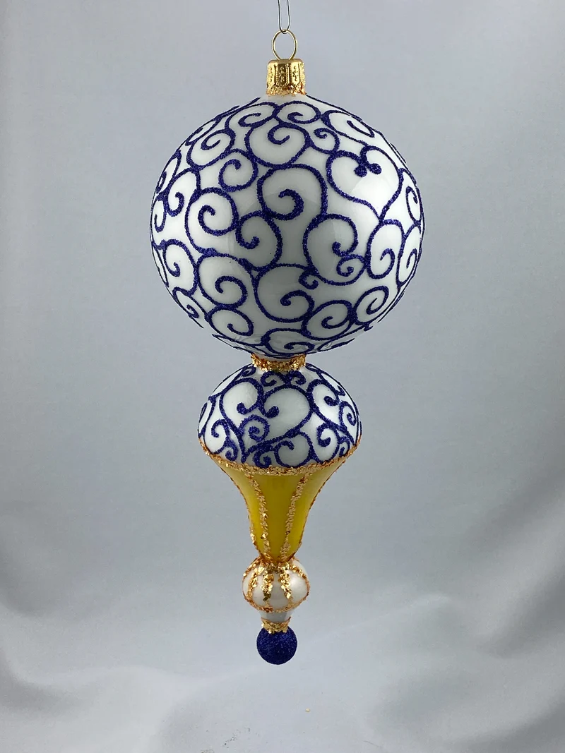 Grosse Fantasie-Form in Weiss und Gold mit goldenem Reflex und blauem Dekor