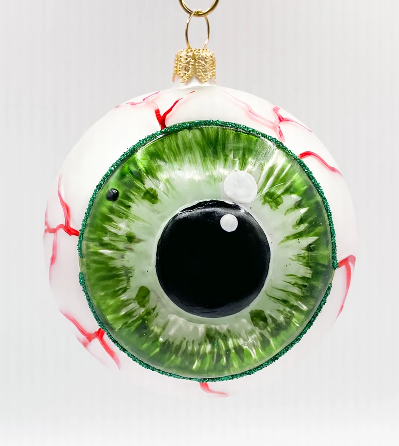 Anatomisches Auge mit grüner Iris und runder Pupille