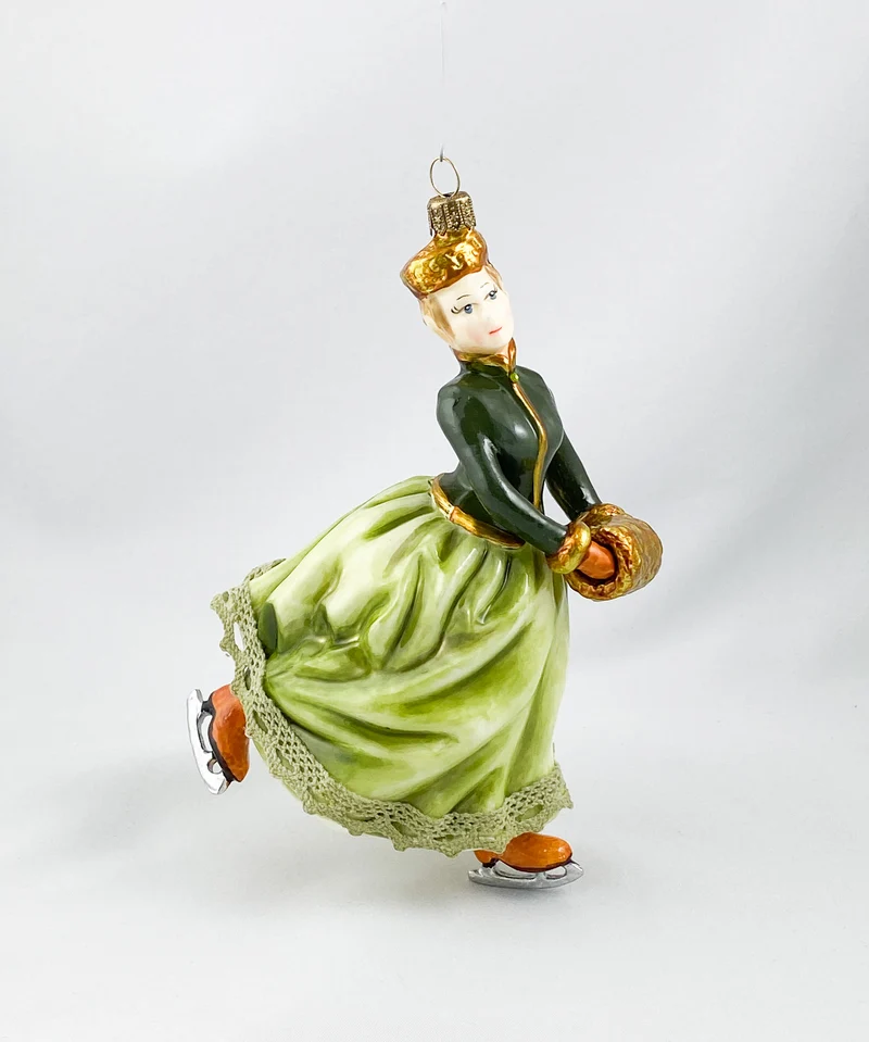 Eiskunstläuferin in elegantem Kostüm, AtlasArt