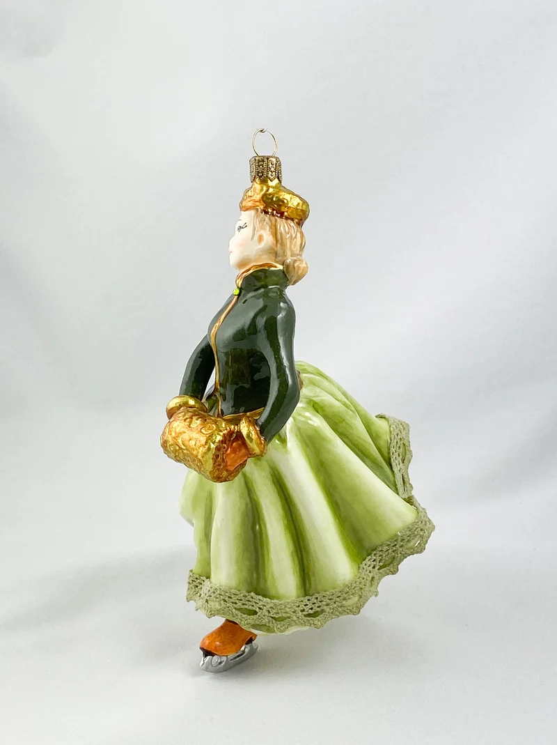 Eiskunstläuferin in elegantem Kostüm, AtlasArt