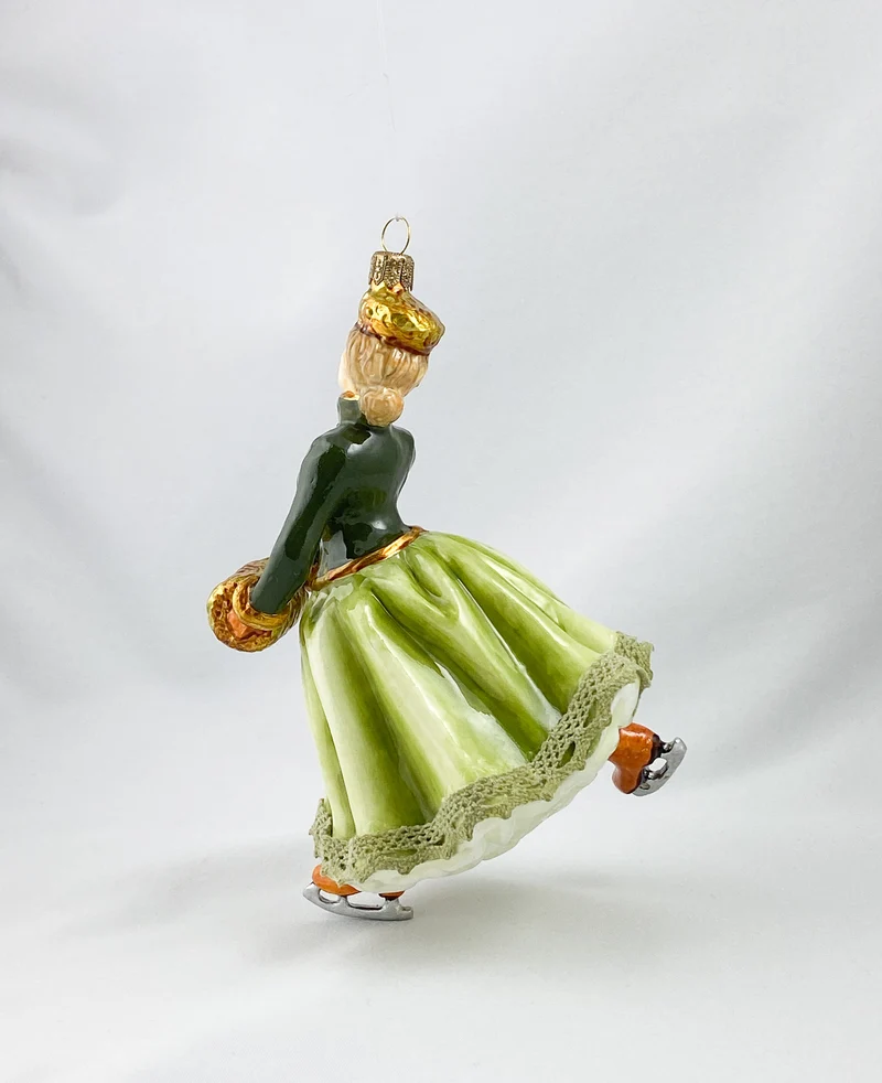 Eiskunstläuferin in elegantem Kostüm, AtlasArt