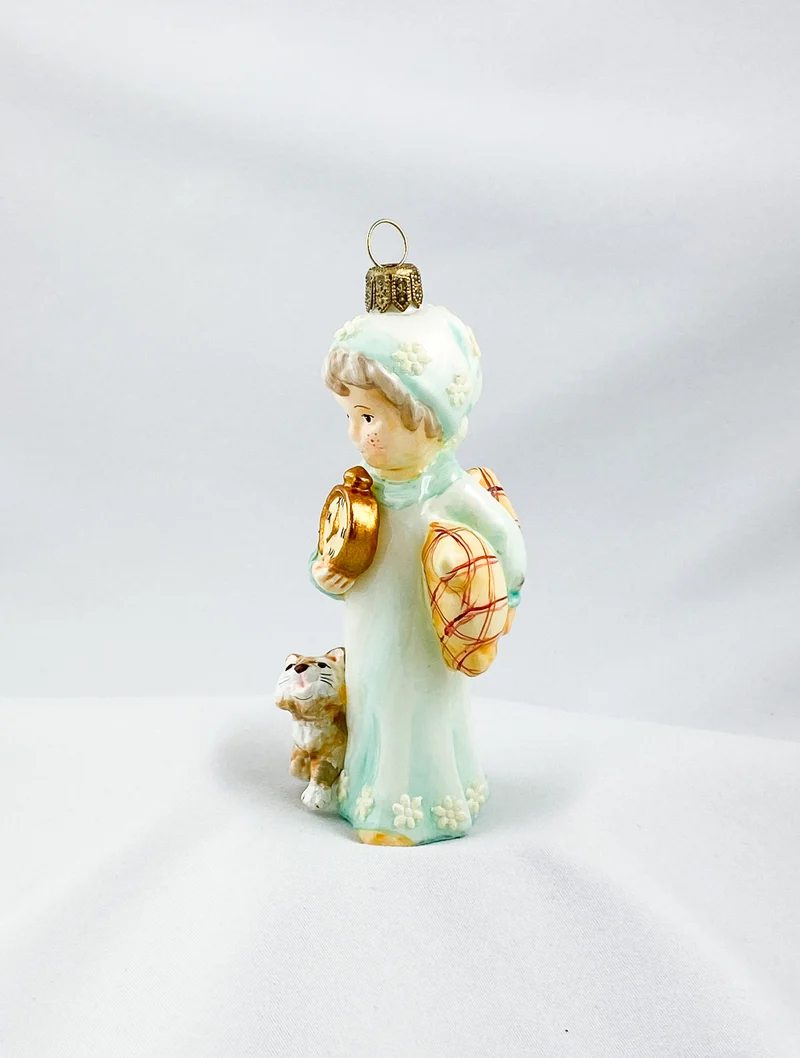 Das kleine Mädchen wartet gespannt mit dem Kätzchen auf das Christkind, AtlasArt