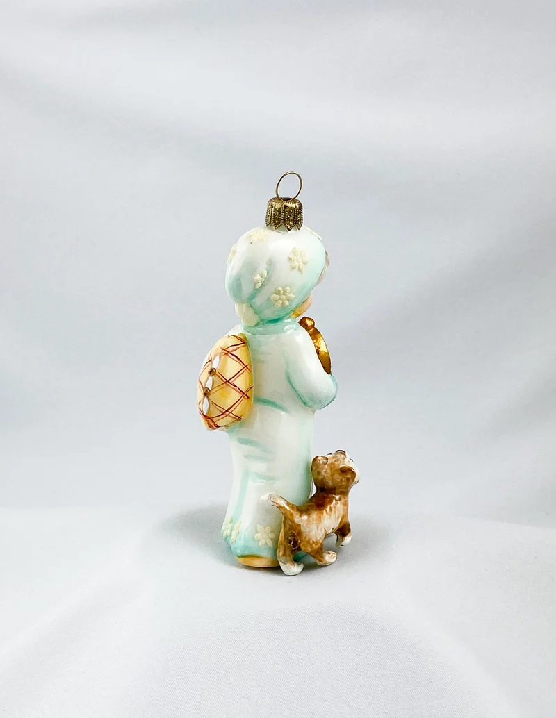 Das kleine Mädchen wartet gespannt mit dem Kätzchen auf das Christkind, AtlasArt